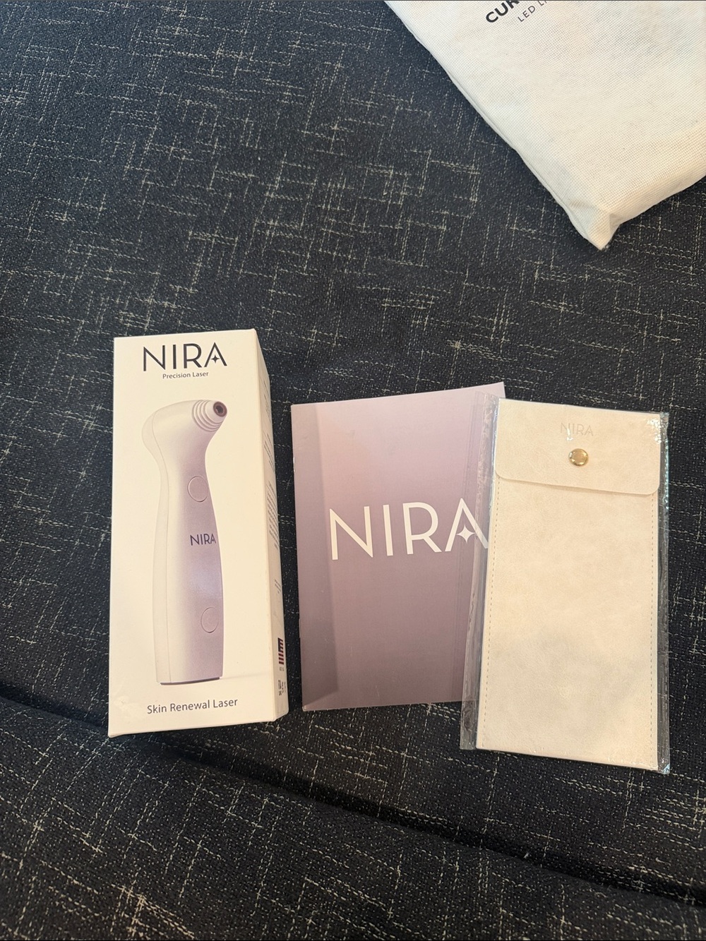 NIRA Skin Renewal Laser Device in Light Pink - At-Home Precision Care